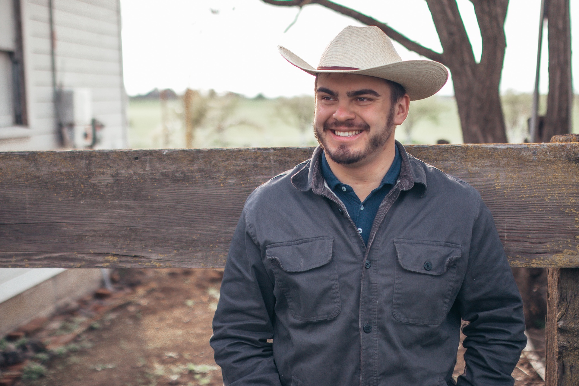 Andrew Ranger Kielak smiling in a cowboy hat
